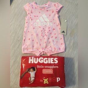 Baby Girl adidas romper and Pampers.